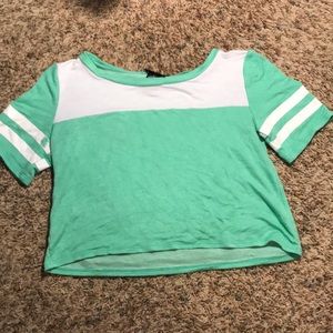 Teal t-shirt with stripes on the sleeves